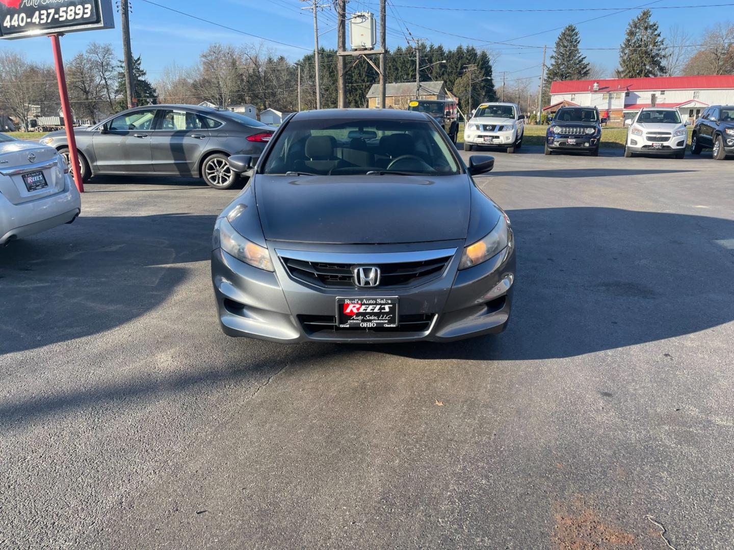 2012 Gray /Black Honda Accord EX Coupe AT (1HGCS1B74CA) with an 2.4L I4 DOHC 16V engine, 5-Speed Automatic transmission, located at 547 E. Main St., Orwell, OH, 44076, (440) 437-5893, 41.535435, -80.847855 - Photo#1